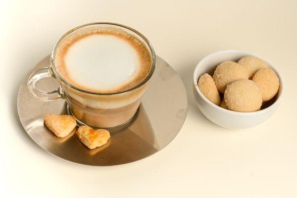 Cappuccino coffee with patty's shortbread