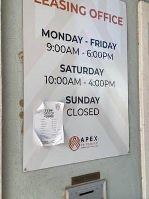 "Temporary" adjusted hours sign