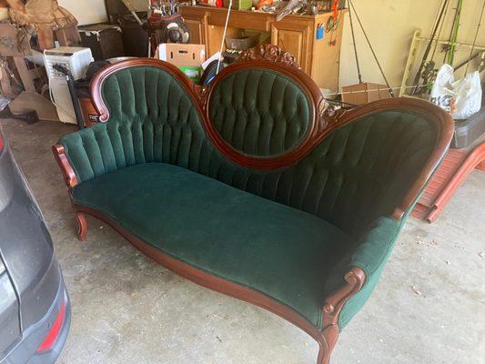 After: Emerald green, fixed underneath the sofa cleaned up the wood scuffs