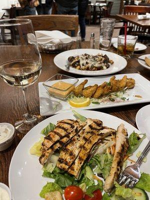 House salad with chicken.  Fresh sheet menu rotates every few weeks. Pictured was the cornbread shrimp and poutine fries.