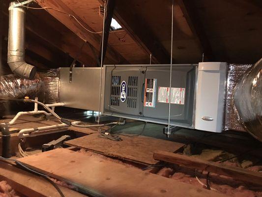 20 SEER system hanging in an attic.