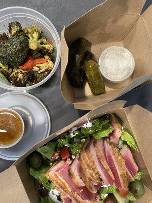 Charred broccoli salad, House - Made Dolmas and Greek salad with tuna