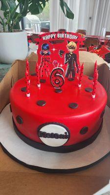 Beautiful last minute (day before) custom cake (miraculous ladybug) was beautiful and was delicious!! I provided the topper and candles.