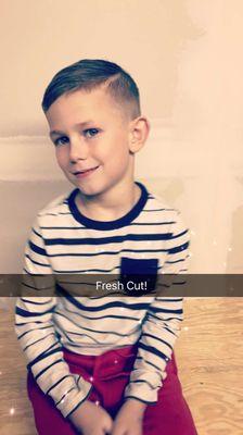 My 6 year old after his latest hair cut with Jenna!