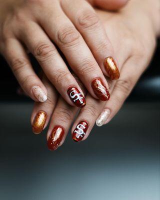 49er nail design with gold red and glitter!