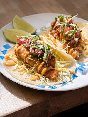 Thai battered snapper fish tacos, with tri-pepper pico, remoulade, lime and corn tortilla. Two for $15.