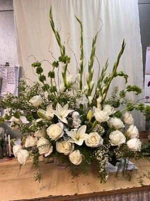 Beautiful hand designed and personal sympathy arrangement. Able to work with any price range.