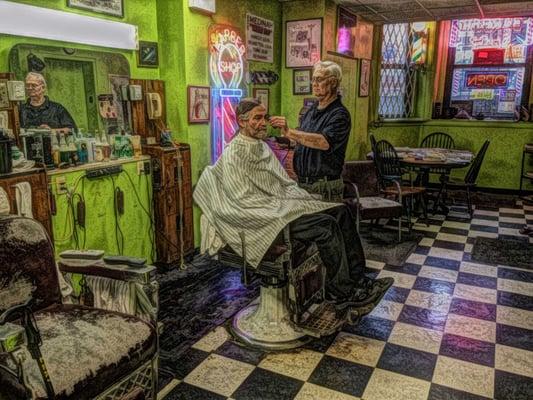 Ron (the barber) cutting hair in his awesome Chicago Barber Shop. - Great ambiance (very Rockwellian).