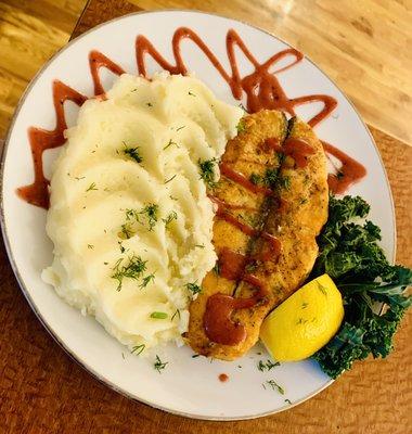 Salmon Stake with pomegranate sauce and mashed potatoes