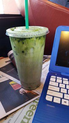 Large iced matcha latte with coconut milk. Poorly blended, but pretty, I guess.