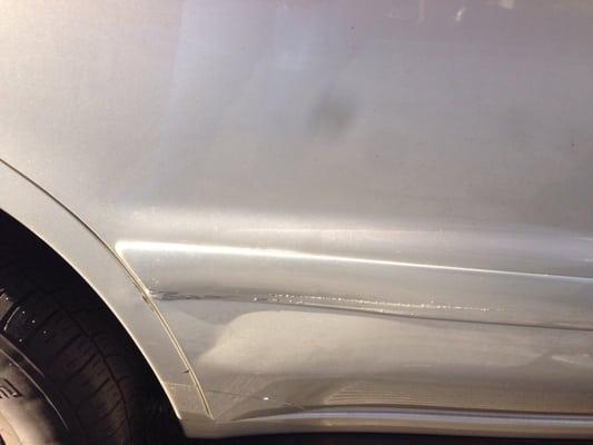 Before pic of the dent on right side. This is the only thing they fixed for $544.37