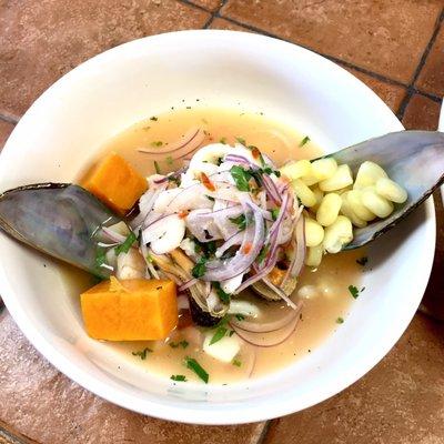 Ceviche Mixto - Fish & Seafood marinated in fresh lime juice, aji limo pepper cilantro and red onion - $14, price of 3/18/2017.