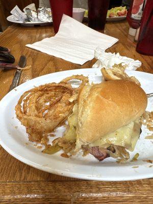 Homemade onion rings and polish dog.