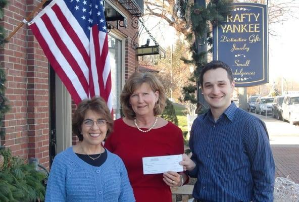 Our annual donation check for the Beacon Santa program that helps less fortunate families during the holidays.