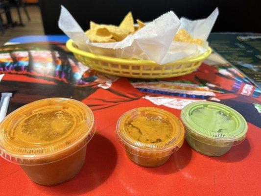 Complimentary chips and salsas...