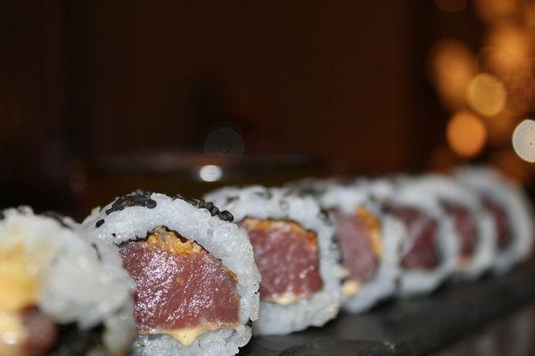 The Big Eye Tuna Roll was made with crisp onion, sushi rice, and yuzu kosho.