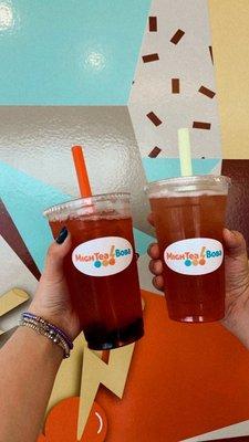 Watermelon fruit tea with tapioca and strawberry fruit tea with cherry boba