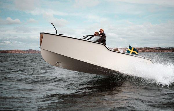 The XShore electric boat is a sleek and innovative vessel that blends modern technology with classic Scandinavian design.