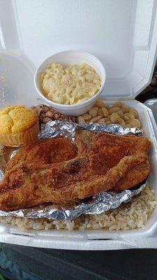 Fried Pork Chops, Mac and cheese, butter beans, black eyed peas and rice and gravy with a cornbread muffin