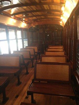 Inside an older street car that is being restored