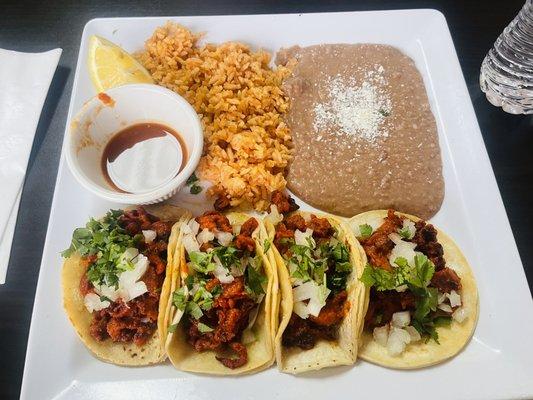 4 Pastor tacos with rice & beans!