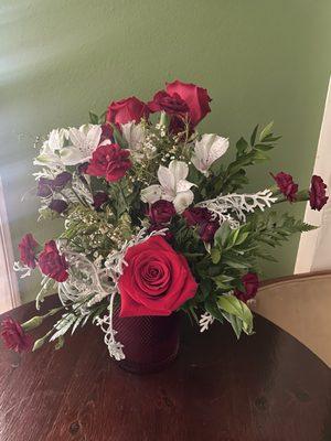 After bringing it back to the shop, they added 3 roses