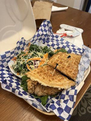 Chicken and waffle sandwich with kale salad