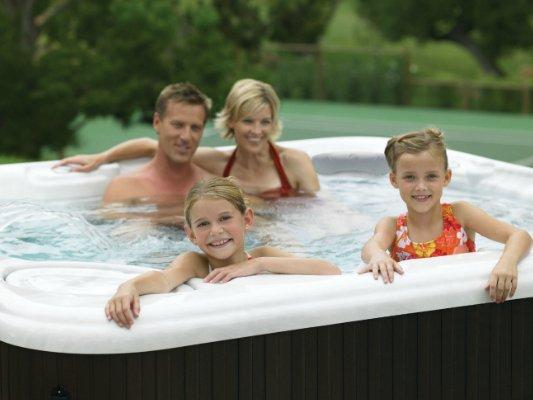 Enjoy family fun and relaxation with a Hot Spring Spa from Olympic Hot Tub!