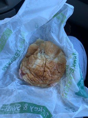 Ham & Swiss croissant  huh look at this ugh NOPE wish I would have looked at this when they gave me my order