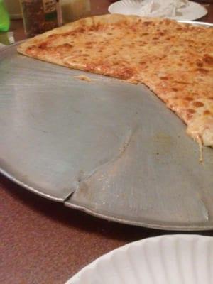 Pizza on cracked metal pizza pan. Unsanitary. Pizza was fair. Nothing near great.