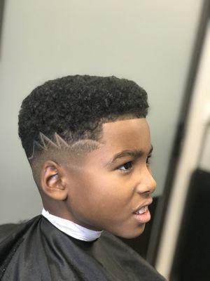 Lions Cub Haircut with small design included. Book this service.