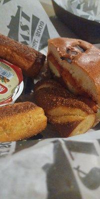 Gooey Burger (cheese curds and provolone cheese) and pretzels with dry rub seasoning.