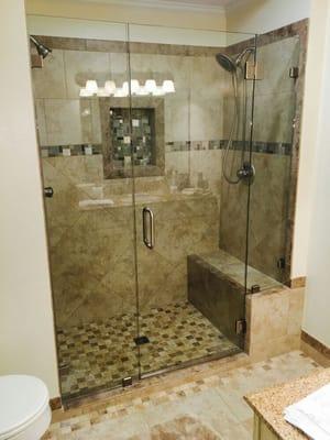 Frameless shower enclosure with chrome hardware installed by our team. Call us at 281-714-0745 for a free estimate #framelessshowerdoor