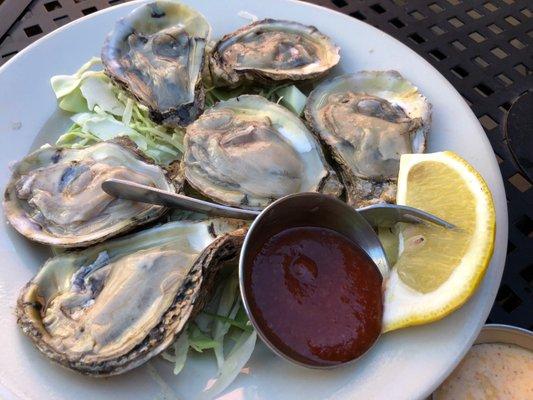 Happy hour dollar oysters!