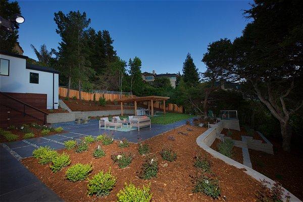 Walls, Pergola, Concrete, Outdoor kitchen, planting and mulch. All in one