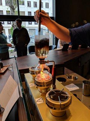 Siphon brewing in action