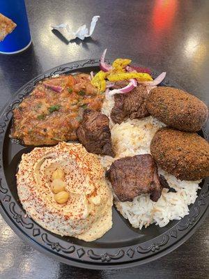 Beef and falafel with hummus and eggplant and tomato