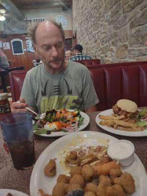 This is part of sampler platter Salad Hamburger and fries