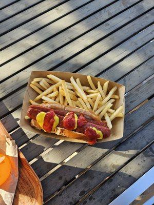 Hot dog with brioche bun, the fries are like McDonald's style