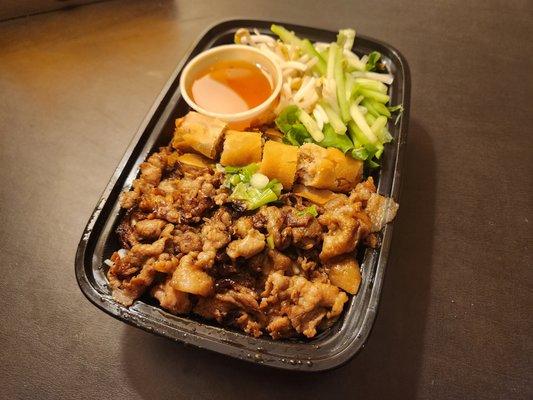 B1 bun thit nuong cha gio (grilled pork and egg roll over vermicelli noodles), $14.95