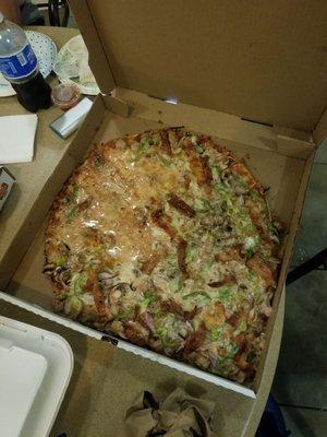 All toppings slid to one side of the pizza.  Pizza also did not taste good.