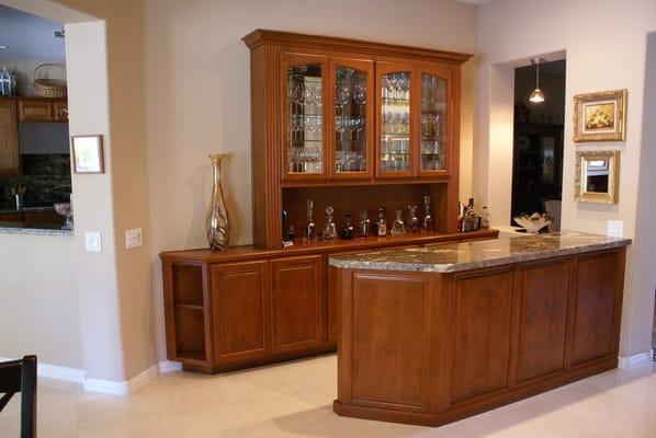 Not a lot of space? This bar takes advantage of a small open area and provides storage, display, and lots of counter space.