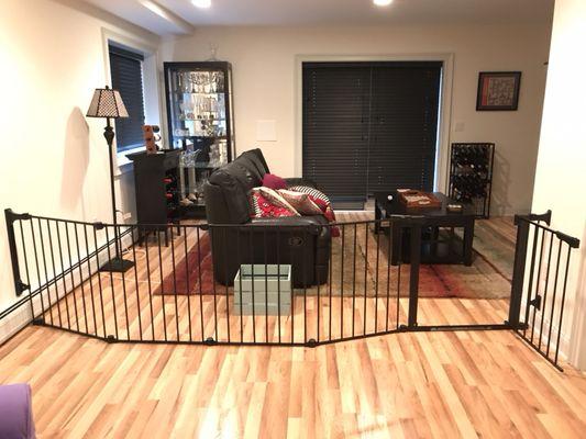 Over sized gates which cuts a room in half.