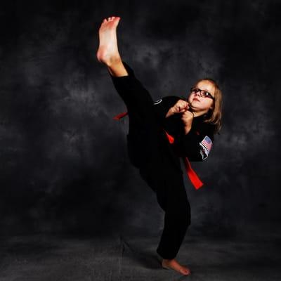 Kickpics photo of student doing kick.