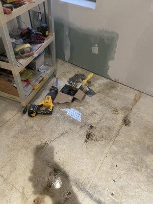 Water flowing across my basement floor even after removing the damaged flooring