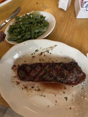 NY Strip cooked med rare with a side of green beans