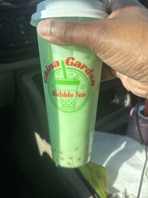 Honey dew bubble tea with mango pop