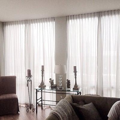 Double layer sheer curtains.