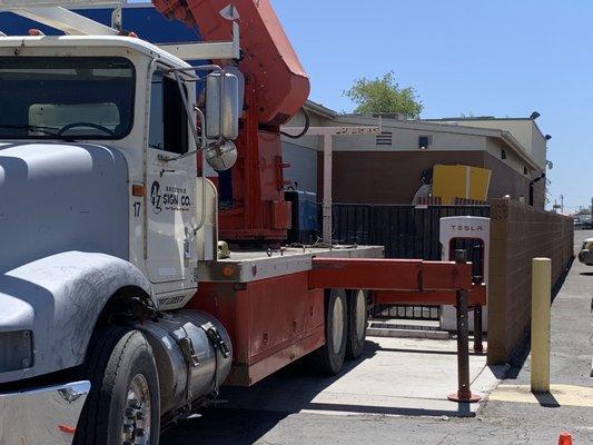 Sign truck blocking 3 of 4 stalls.  Why not block the gas tanks?