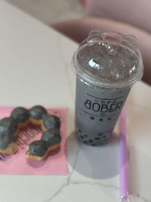 Black sesame tea with brown sugar boba and black sesame mochi donut